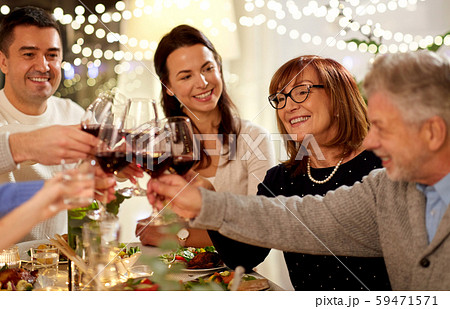 happy family having dinner party at home happy family having dinner party at home 59471571