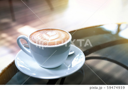 hot latte coffee put on table in cafe restaurant, drink breakfast in the morning day hot latte coffee put on table in cafe restaurant, drink breakfast in the morning day 59474939