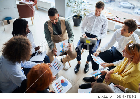 Successful team work in office, discussing 59478961