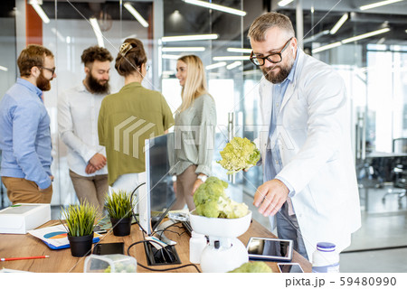 Senior nutritionist working in the office 59480990