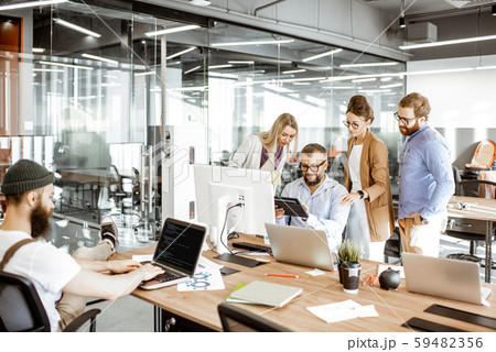 Office work with diverse coworkers Office work with diverse coworkers 59482356