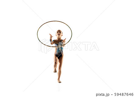 Little flexible female gymnast isolated on white studio background 59487646