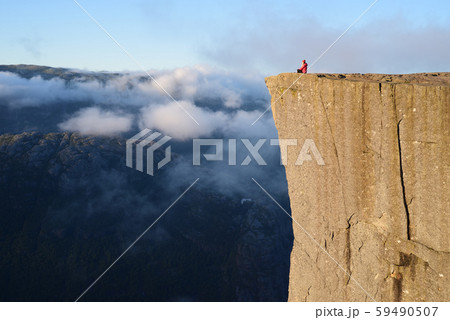 Girl on the Rock Preikestolen, Norway Girl on the Rock Preikestolen, Norway 59490507
