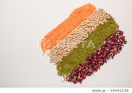 Concept of legumes chickpeas, lentils, beans, mash. Protein plant background top view Concept of legumes chickpeas, lentils, beans, mash. Protein plant background top view 59491236