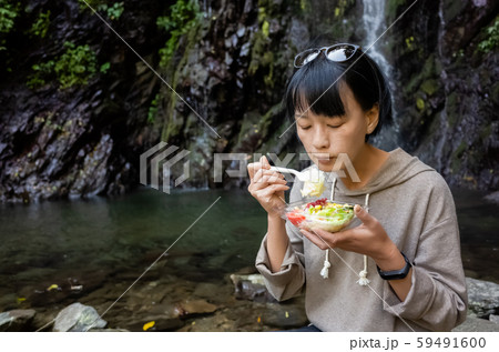 Asian woman eat salad Asian woman eat salad 59491600