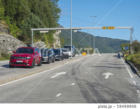 Fjaerland, Norway, September 8, 2019: Cars waiting for Ferry boat over Sognefjord from Sogndal 59499906