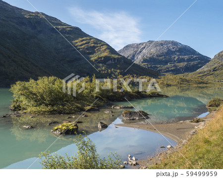 Milky blue glacial water of Lake Bovertunvatnet in the Jotunheimen National Park, Norway. Early 59499959