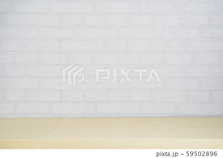 Empty wood plate top table on gray brick background. 59502896