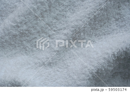 壁紙素材 バスタオル 白 影 表面の写真素材