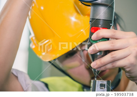 Asian female engineer factory inspection with hand 59503738