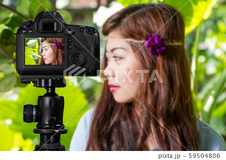 Filipina female social media star in a garden 59504806
