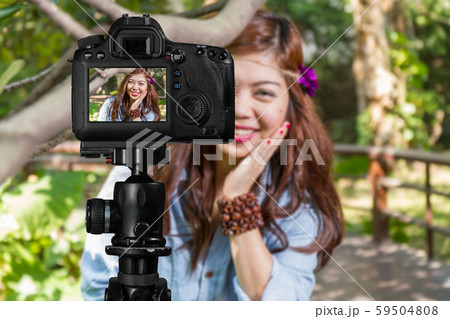 Filipina female social media star in a garden Filipina female social media star in a garden 59504808