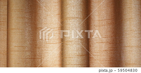 壁紙素材 美しいカーテンの光 薄茶オレンジ色の写真素材