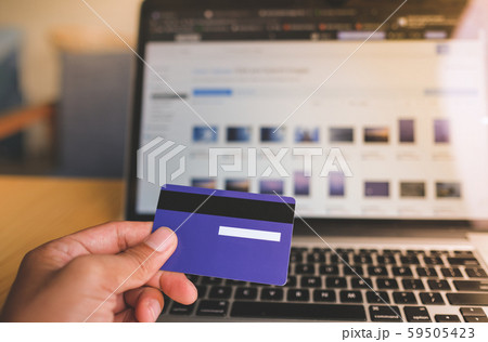 Comfort e-commerce shopping. Royalty high quality free stock photo image of shopping online and payment by credit card. Using laptop and mobile phone to online shopping and pay by visa credit card Comfort e-commerce shopping. Royalty high quality free stock photo image of shopping online and payment by credit card. Using laptop and mobile phone to online shopping and pay by visa credit card 59505423