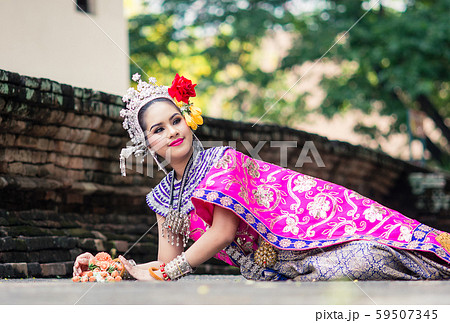 Asian woman wearing typical, traditional Thai Asian woman wearing typical, traditional Thai 59507345