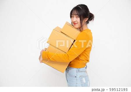 Happy Asian woman holding package parcel box, Happy Asian woman holding package parcel box, 59512193