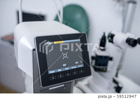 Special modern equipment for eyesight analysis standing in the room Special modern equipment for eyesight analysis standing in the room 59512947