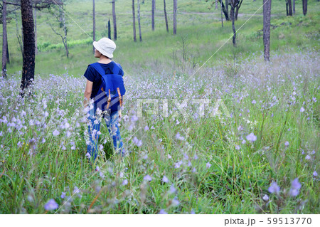 Asian woman standing backpacking in the Asian woman standing backpacking in the 59513770