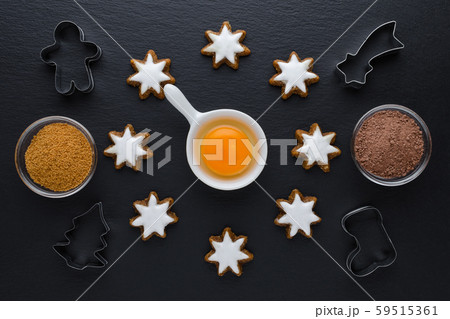 star cookies like a clock and kitchen tools with cocoa and brown sugar for dessert baking star cookies like a clock and kitchen tools with cocoa and brown sugar for dessert baking 59515361