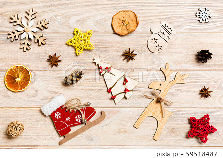 Top view of Christmas toys on wooden background. Top view of Christmas toys on wooden background. 59518487