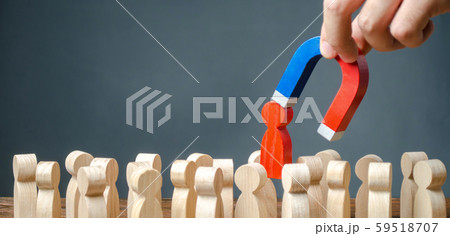 businessman pulls out a red figure of a man from the crowd with the help of a magnet. leader manages the business and forms a team. toxic, incompetent worker. Increase team efficiency, productivity. businessman pulls out a red figure of a man from the crowd with the help of a magnet. leader manages the business and forms a team. toxic, incompetent worker. Increase team efficiency, productivity. 59518707