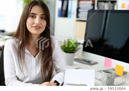 Pretty designer in modern office 59523004