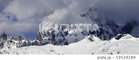 Mount Ushba in haze at sunny day 59529289
