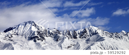 Snow mountains in winter sun day Snow mountains in winter sun day 59529292
