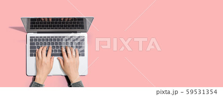 Person using a laptop computer Person using a laptop computer 59531354