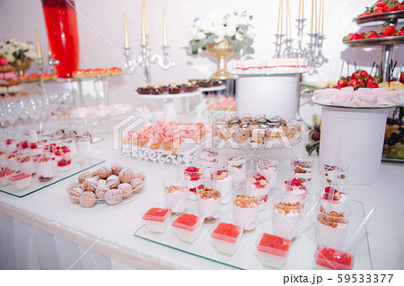 Sweet desert on the table. Different desserts on candy bar 59533377