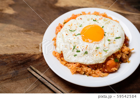 Kimchi fried rice with fried egg on top, Korean food 59542584