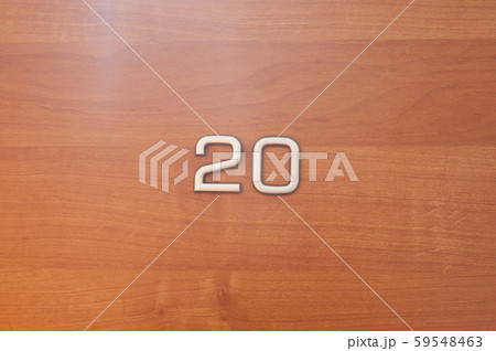 Table number twenty hanging on a wooden door Table number twenty hanging on a wooden door 59548463
