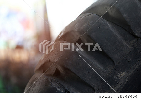 Wheel of a large lorry is standing outside Wheel of a large lorry is standing outside 59548464