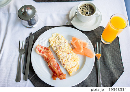 Healthy tasty breakfast on table in outdoor cafe 59548554