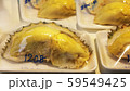 Processed and packaged durian fruit in polystyrene foam containers and plastic wrappings 59549425