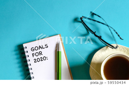 2020 new year goal, plan, action text on note pad. 59550434