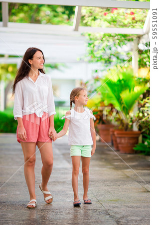 Beautiful mother and daughter at Caribbean beach enjoying summer vacation 59551091
