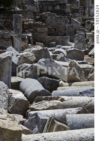 The ruins of the ancient antique city of Ephesus the library building of Celsus, the amphitheater temples and columns. Candidate for the UNESCO World Heritage List The ruins of the ancient antique city of Ephesus the library building of Celsus, the amphitheater temples and columns. Candidate for the UNESCO World Heritage List 59552624