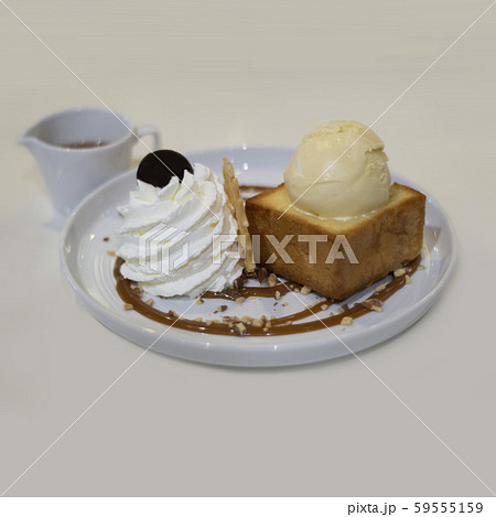 honey toast with vanilla ice-cream and whipped 59555159