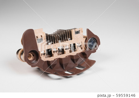 Close-up of a new relay regulator equalizing the voltage in the generator. New auto parts 59559146