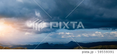 Overcast sky and cloud at the mountain range in the background 59559391
