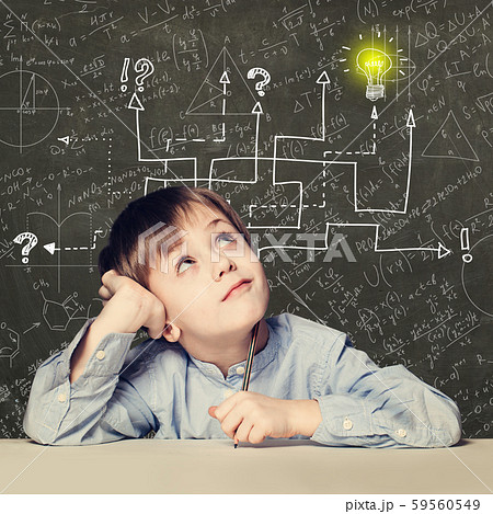 Thinking child boy with question signs and light Thinking child boy with question signs and light 59560549