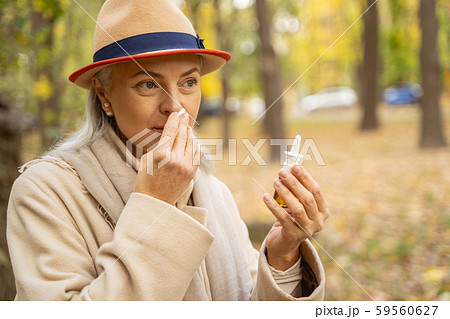 Ill Caucasian lady looking into the distance 59560627