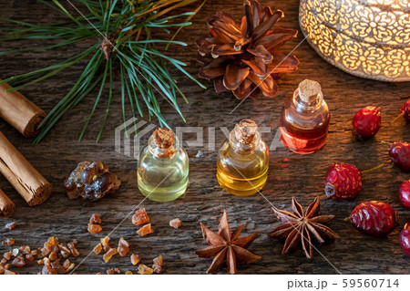 Christmas mix of essential oils with frankincense, myrrh, cinnamon, star anise and dried rose hips 59560714