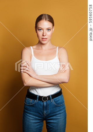 Nice woman with crossed arms standing  59560758