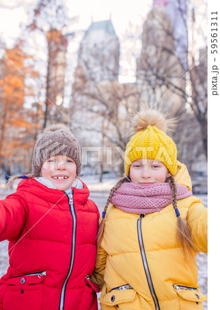 Adorable little girls in Central Park at New York City 59561311