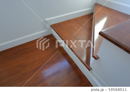 brown wooden hardwood stair in modern residential house 59568011