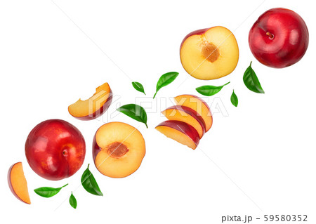 fresh red plum and half with leaves isolated on white background with copy space for your text. Top fresh red plum and half with leaves isolated on white background with copy space for your text. Top 59580352
