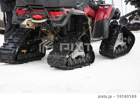 Closeup of snowmobile with snow at ski resort. 59580589