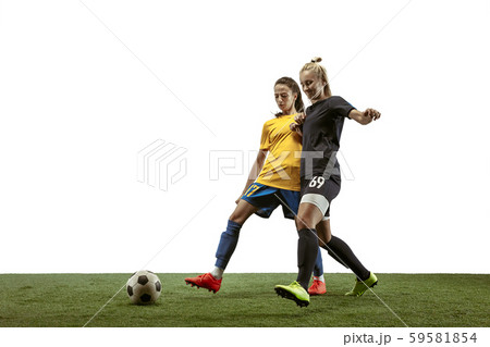 Female soccer players practicing and training at the stadium 59581854